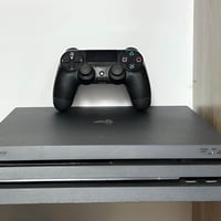 من رخصه الادمن بلي 4 برو 4k ذاكره واحد تيره مع ملحقاته  الجهاز لوك ويا...