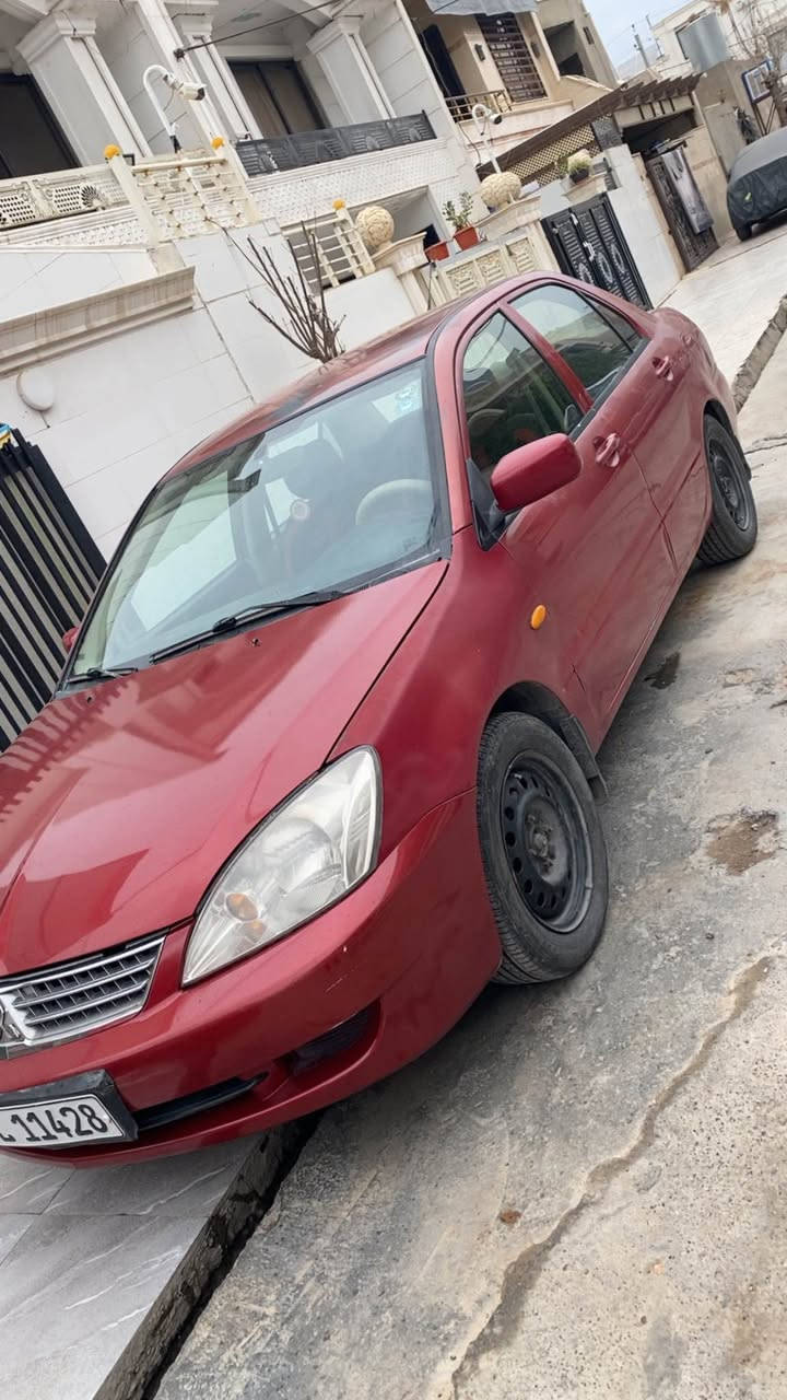 لانسةر 2009 مةكينة گةورة ناو زةرد فؤرميكا زؤرخاوين زؤر توندو تؤل تازة پيشيم توند كردؤتةوة جوار تايةي نوئ ية. ***********. أربيل, العراق
