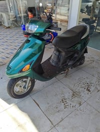 دراجة • نجف • محرك ما مفتوح