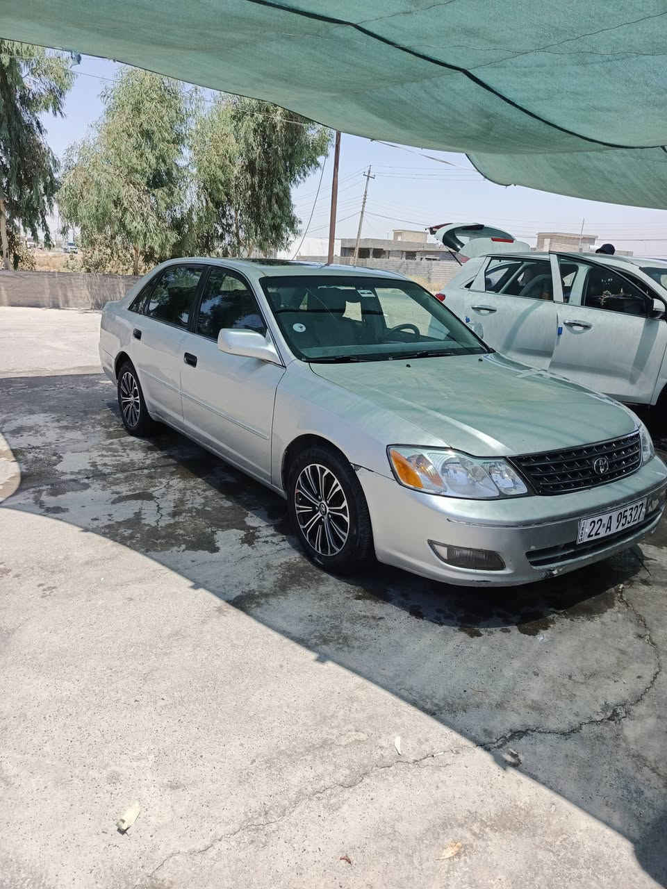 🚗 تويوتا أفلون موديل2000 (امريكي) - للبيع 🚗
السيارة نظيفة جداً وجاهزة 
🔹 المواصفات العامة:
الموديل: 2000.
المحرك والكير: بحالة ممتازة (جديد).شرط 
الرقم: شمالي  تحويل مباشر، باسمي ثاني تحويل).
الوضعية القانونية: مفحوصة حاسبة عامة في كل محافظات العراق (سليمة تماماً من السرقة أو الحجز).
🔹 الوضع الميكانيكي والكهربائي:
التبريد : تبريد ثلج .
الكهربائيات: مكفولة بالكامل، جميع الكيجات والأنظمة شغالة.
التخم إطارات: جديد بالكامل مع ويل كب جديد.
الحدادية: أمامية وخلفية جديدة (تراي السيارة وين ماتريد).
🔹 الإضافات والجمالية:
الداخلية: نظيفة جداً وبحالة الوكالة ، ولا يوجد أي ضوء تحذيري مشتعل في الدشبو.
الشاشة: مزودة بشاشة وكاميرا خلفية.
الجام واللايتات: جام أمامي جديد، ماصدات الشركة، لايت أصلي (الناصي أصفر، والعالي ثلجي).
🔹 حالة البودي (الصبغ):
(حزام كلير بدون داخل).(بدون جنطه وقماره وبنيد) 
📍 الموقع: صلاح الدين- الضلوعية
📞 للتواصل والاستفسار: ‏‪***********‬
