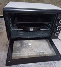 فرن كهربائي • كأنه جديد • هفلان