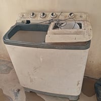 غساله للبيع شغاله بس المجفف ما 07735898494يشتغل سعر 35/