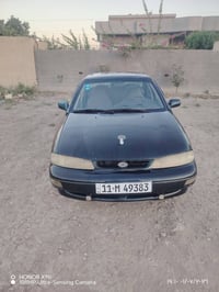 كيا سيفيا للبيع فول عادي مصبوغه عام موديل 96 رقم بغداد العنوان بغداد ا...