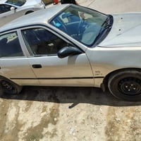 كورله موديل 2000 رقم بغداد سنويه لل 28 انكليزي جاهزه كير ومكينه وتبريد...