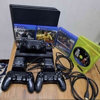 متوفر بلي فور سلم اونلاين يحتوي على ثلاث جوستكات و خمس اقراص gta , cal...