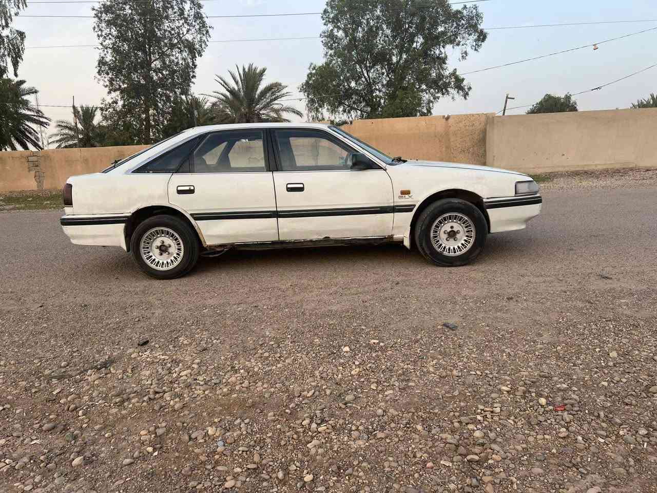 للبيع مازده بغداد رقم نكليزي سنويه لغاية 29 هزه جديده سعر 25$ رقم ‏‪***********‬‏  سياره محرك وكير عادي مكفولات حدادا جيد جداً كهربائيات شغاله ويل كب دواخل نضيفه مكاني بغداد
