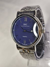 IWC • مكينة كوارتز • سير ستانلس