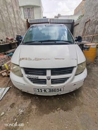 دوج كرفان للبيع موديل 2001 رقم بغداد بسمي مكان سياره حله 07803406030