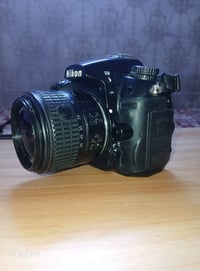 كامره نيكون للبيع  d7000  مالحقاته  عدسه 18_55+ بطاريه +شاحنه+جنطه +حز...