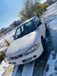 پرۆتۆن • ٢٠٠٢ • کۆیە