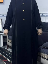 قطعة • ملابس