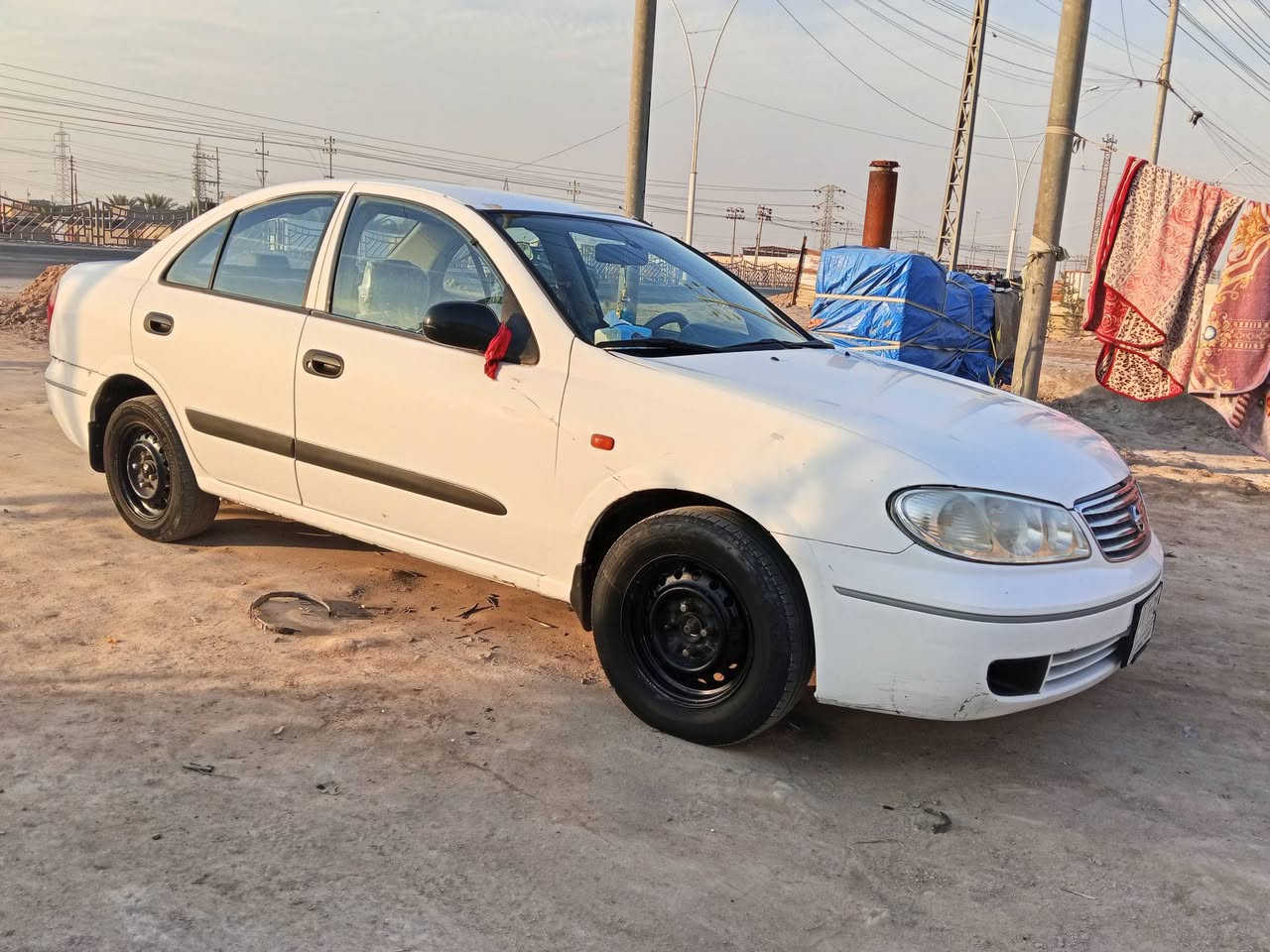 السلام عليكم نيسان سني ياباني موديل 2005
 محرك قبق اسود مكينه بيها تنقيص بدون بخار فقط تنقيص گير اوتماتيك رقم قادسيه مشروع وطني حداديه 80% البدي شوفت عينك بي طخات بسيطه مكاني البصرة السعر 75 وبيها مجال قليل واذا اكو مراوس اراوس للاستفسار ***********
