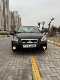 كيا ريو موديل 2011 خليجي فول مواصفات عدى الفتحى  ماشية 98 ألف حقيقي شر...