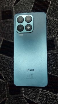 هونر أكس 8a • نضيف • شاحن اصلي