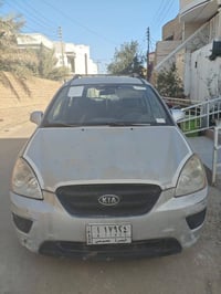 كيا روندو ستيشن ٢٠٠٩ وارد امريكي محركها ٢٥٠٠ ضربتها ب الجاملغ الامامي ...