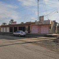 الحي العصري • محلات وقطعة أرض • ٤٨٠م