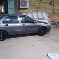 لانسر ٢٠١٠ • مكينة جديده • رقم كربلاء