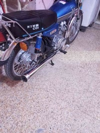 دراجة نارية • موديل ٢٥ • كحلاء