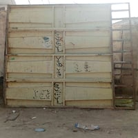 ارتفاع ٣.٥م • عرض ٣م • بابين