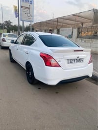 نيسان سني • ماشيه ٣٠٠٠٠ • رقم اربيل