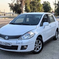 نيسان فيرسا موديل 2009 ماشيه 210000 الف محرك 1800كير at رقم بغداد هزه ...