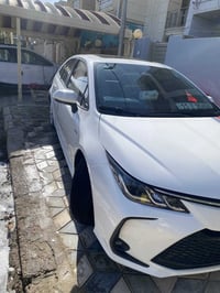 👋 كورلا هايبرد 🔋⚡️.  الموديل 2025 رقم بغداد .11 داخل احمر 🔴 كشن كهربا ...