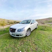 جيلي • مكينة لانسر • قير مزدوج