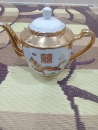 قوري • مامستخدم