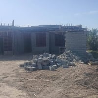 ارض زراعيه للبيع تحتوي عله بيتين واحد جاهز وثاني واصل للصب وجميع الخدم...