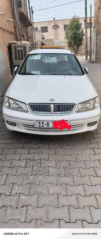 نيسان صني • ٢٠٠٢ • باسمي