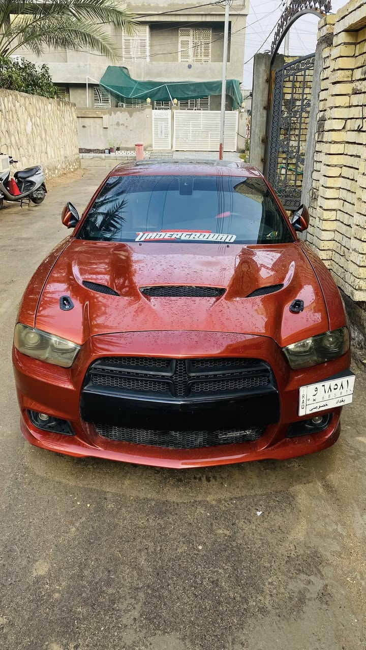 سلام عليكم  شباب
2013
RT. 5.700
عليها برمجه حلوه 

السياره فول. مواصفات للخير. 

وارد امريكي  ::ضررها جاملغ الامامي جهت الصدر  صبغ ::او باب الصدر اكلير من امريكه  والبنيد محدث 
3قطع 

رقم. او سنويه اوهزه جدد 
رقم انكليزي. جديد بغداد 

حداديه اماي وخلفي  جدد صارلهن اقل الشهر 

كير مكينه كفاله 
تخم تاير جديد 

عليه كت كامل SRT

السعر 140 اوبيها مجال كلش بسيط للطيبين 

مكان السياره كربلاء 

الرقم ***********
الرقم ***********
