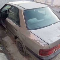مازدا 323 • ١٩٩٠ • اربيل