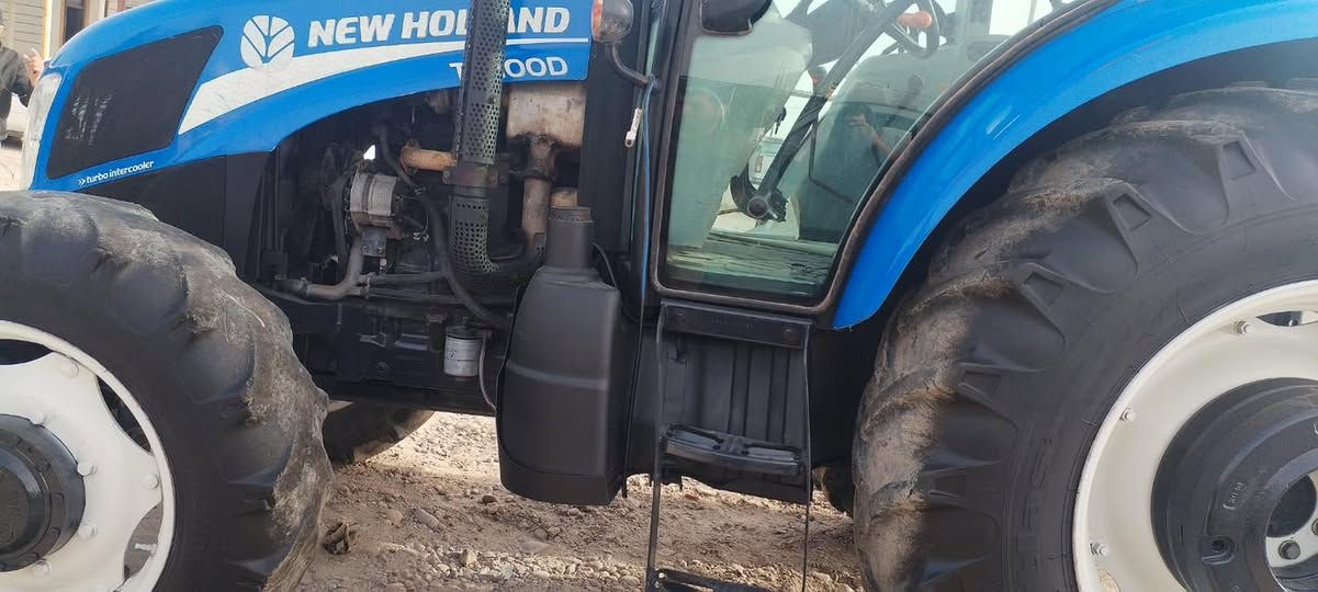 تركتر يوهولند للبيع حجم 100  موديل 2014 الستفسار اتصل ‭٠٧٧٣ ٥٨٩ ٩١٦٧‬
