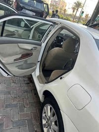 كورلا 2008 خليجي بغداد باااسمي رقم دولي ماشية 266 الف  حادث حوض خلفي ب...