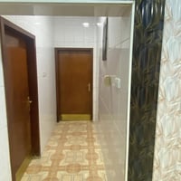 حي القادسية • ٤٠٠م • محلات وشقة