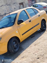 سياره طيبه مصفره هيه وغرامات رقم بغداد سياره جاهزه من كلشي بيهه ضربه ا...