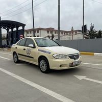 بەناوی خوا نیسان سەنی ٢٠٠١ بیلاد سپی  سەیارەکە زۆر جوانەو ماڵی دۆستە گ...