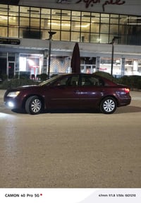 سونات موديل 2009  رقم بغداد وارد امريكي كير ومكينه مكفولات وتبريد وتدف...