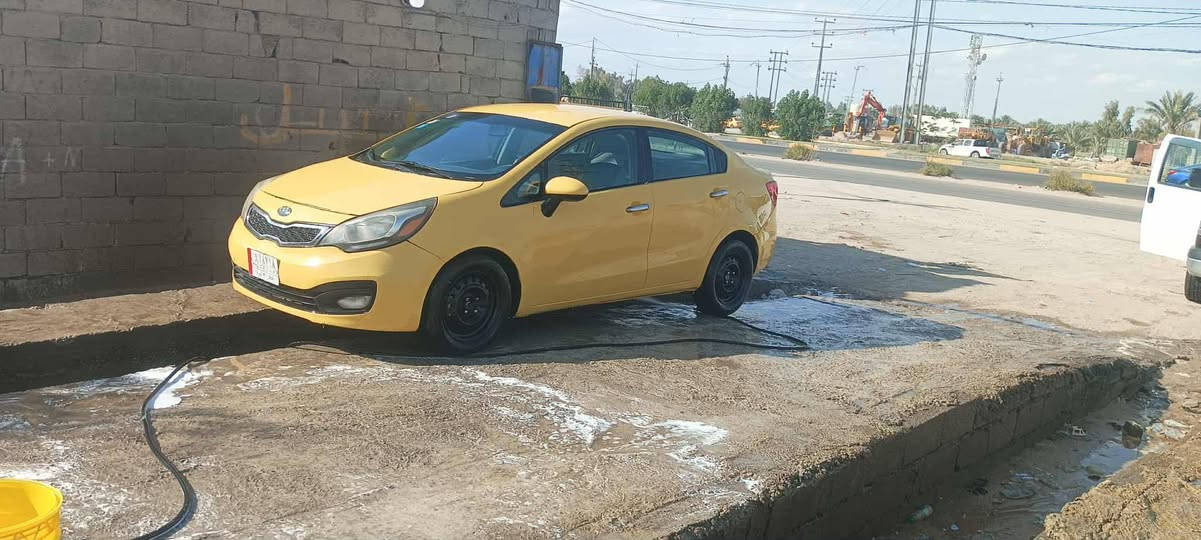 كيا ريو رقم بغداد دولي وارد امريكي محرك 1600  سعر ٨٠
