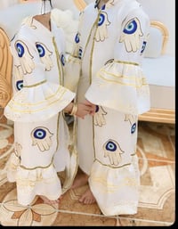 بشت • قفطان