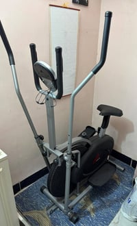 جهاز رياضي منزلي  مستخدم قليل جدا  قدره ١٢٠ كيلو مع قرص لف خصر  شاشه ل...