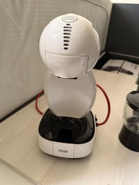 نسكافيه دولتشي غوستو • ماكينة كبسولات • أغطية ملونة