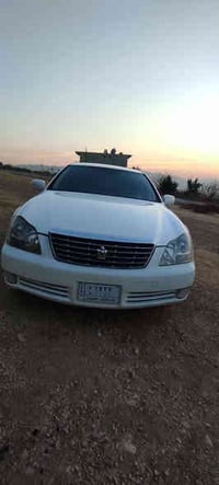 شاهینە 2006سپی دوو دووگمە بەسمە ڕەساسی دەعم و لێدراوی نیە ناو زەرد لای...