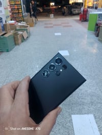 عندي تليفون اس 23 التره لون اسود ذاكره 256 شريحه نسخة اليابانية جهاز ر...