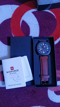 ساعة اصلية • كارت ضمان