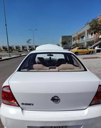 للبيع نيسان موديل 2009 محرك 1800 البدي كوري السعر 110 الرقم بغداد 0770...