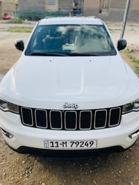 جيب لاريدو للبيع لون ابيض  موديل ٢٠٢٠ رقم بغداد بإسمي ماشية ٨٢ الف ماي...