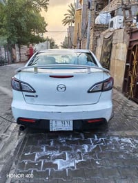 اخوان مازدا ٢٠١٣زوم سياره كامله منقصها شي سعر ٧٥بيهامجال عنوان بغداد ٠...