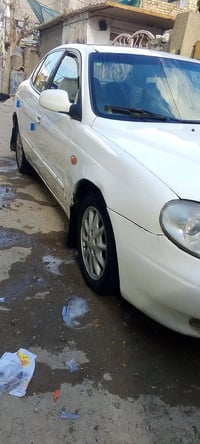 سياره دايو الكنزه موديل 2000 مكينه بيهه خيط بخار كير بحاله جيده كهربائ...