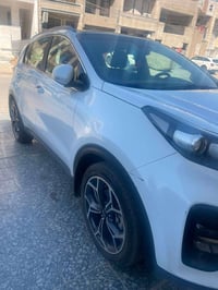 سبورتج 2021 جيتي لاين السعر  205  ماشيه 98 الف كم مكفولة من الصبغ والب...